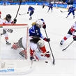 GANGNEUNG, SOUTH KOREA - FEBRUARY 22: USA's Monique Lamoureux-Morando #7 stickhandles the puck in on Canada's Shannon Szabados #1 with Lauriane Rougeau #5 and Brianne Jenner #19 looking on during gold medal round action at the PyeongChang 2018 Olympic Winter Games. (Photo by Matt Zambonin/HHOF-IIHF Images)

